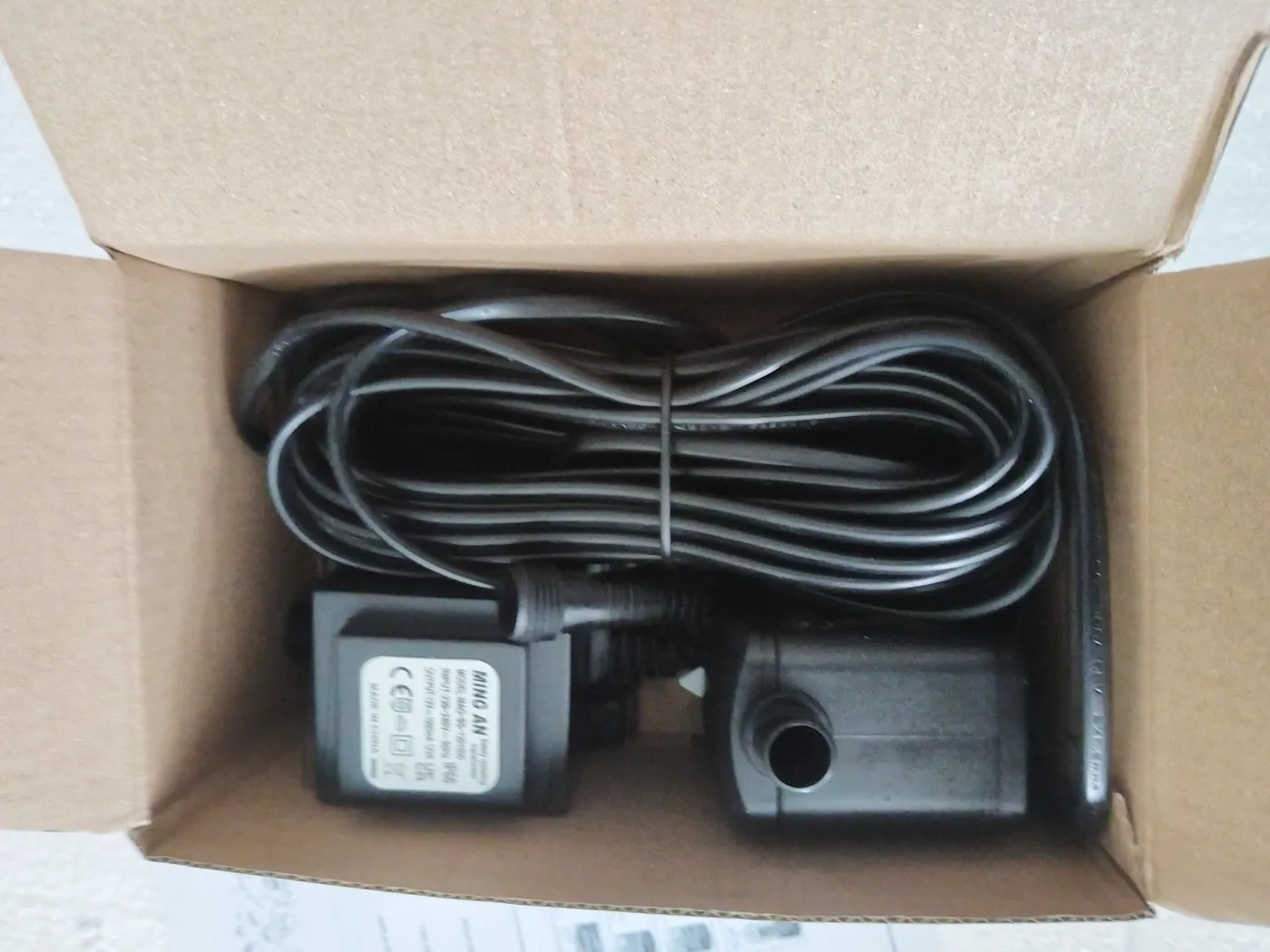 PWFL8367 low-voltage fountain pump packed with its cable