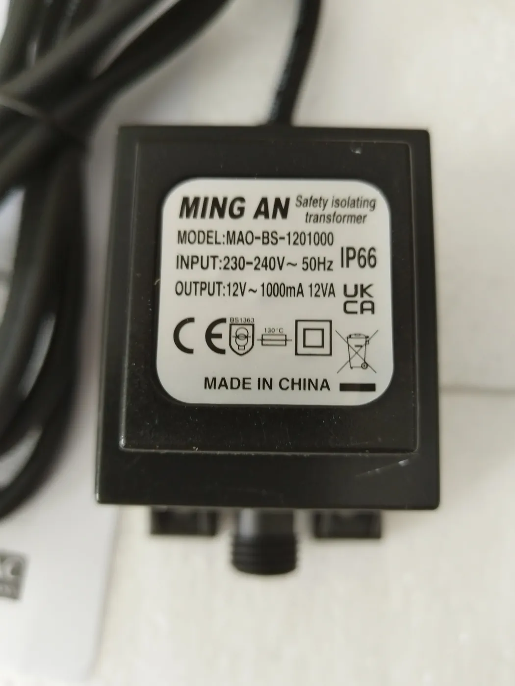 Close-up inspection of the IP66 safety isolating transformer label